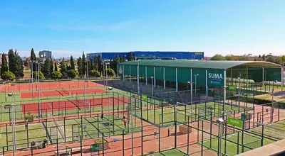 an aerial view of a tennis court with a building at Cosy Loft's Valencia in Catarroja