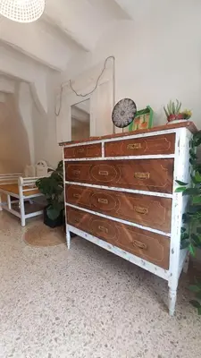 a dresser with a mirror on top of it at CasaJulis Chelva in Chelva