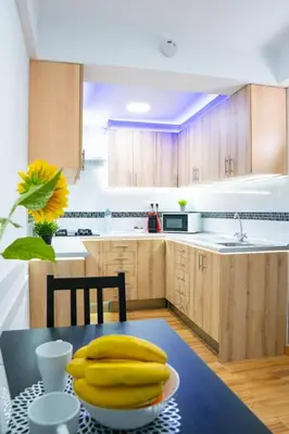 a bunch of bananas sitting on a table in a kitchen at Sollana Arena in Valencia