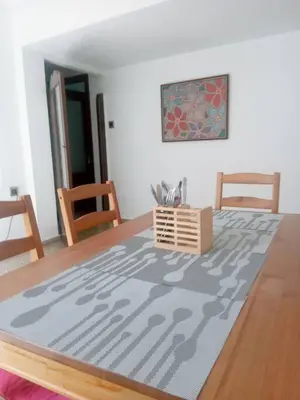 a dining room with a table and two chairs at Nice Spacious Flat in the Center in Valencia