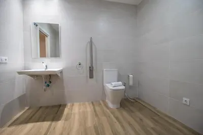 a bathroom with a toilet and a sink at Cid 90 Flat by Concept in Valencia