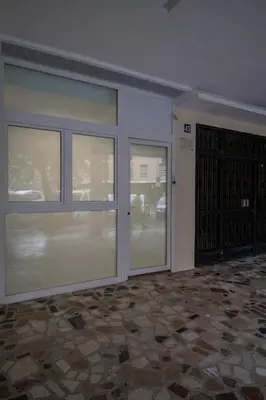 a room with two sliding glass doors in a building at Cid Flats by Concept in Valencia