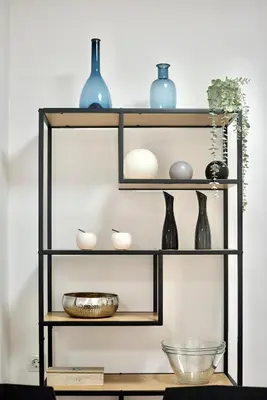 a shelf with bottles and vases on it at SPACIOUS, SUNNY FLAT BY CITY OF ARTS & SCIENCES in Valencia