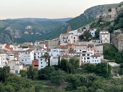 a group of white buildings on a mountain at Mountain Retreat with stunning terrace views in Pedralba