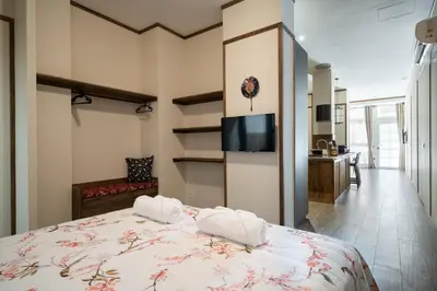 a bedroom with a bed with two pillows on it at Le Japonais de COUP DE COEUR APPARTEMENTS in Valencia