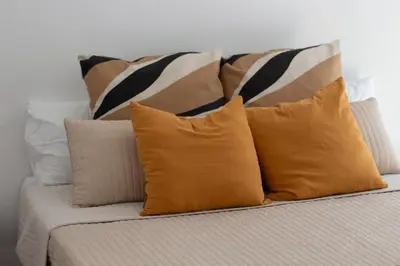 a bunch of pillows sitting on a couch at VLC HOST - Duque de Gaeta in Valencia
