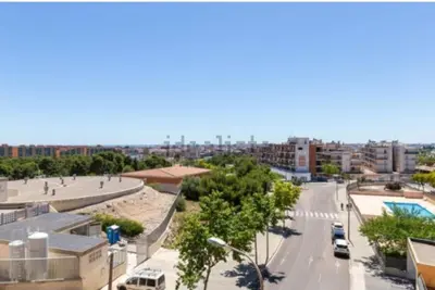 a view of a street in a city with buildings at Vacaciones perfectas. in Paterna