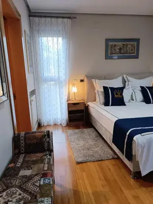 a bedroom with a large bed and a window at Lushville - Luxurious Villa with Pool in Valencia in Campo Olivar