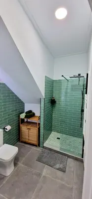 a bathroom with a shower and a toilet at Loft el Baix - Cullera in Cullera