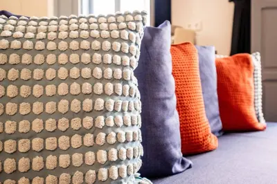 a row of pillows sitting on a couch at Beautiful Suite with Private Terrace in Valencia