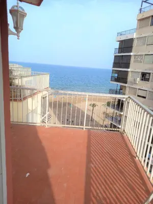 a balcony with a view of the ocean at El Raco, C-9-17 in Cullera