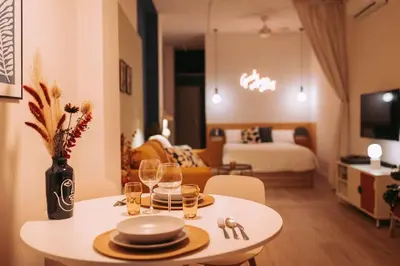 a room with a table with wine glasses on it at Park Central loft. Ruzzafa. in Valencia