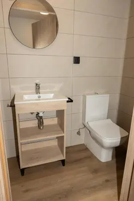 a bathroom with a sink and a toilet at Micampus Burjassot Parque Student Residence in Burjasot