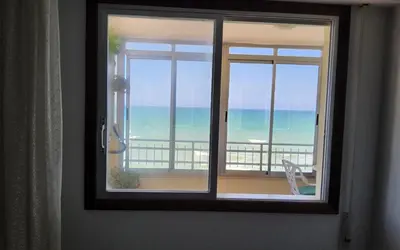 a window with a view of the ocean at Tavernes de Valldigna Chez Svetlana in El Brosquil