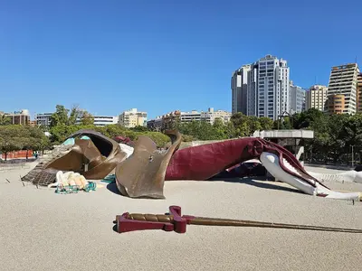 a sculpture of a woman is laying on the ground at Apartamentos Las Ciencias Studio M in Valencia