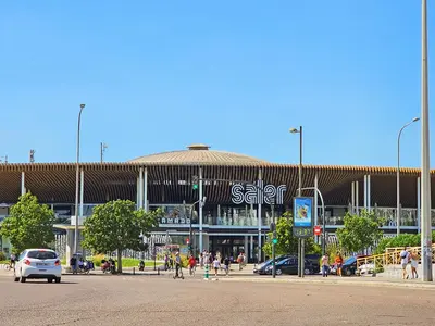 a large building with people walking in front of it at Apartamentos Las Ciencias Studio N in Valencia