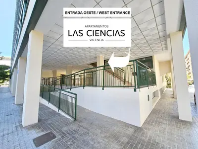 a building with a sign that reads las germaris wa at Apartamentos Las Ciencias Ñ in Valencia