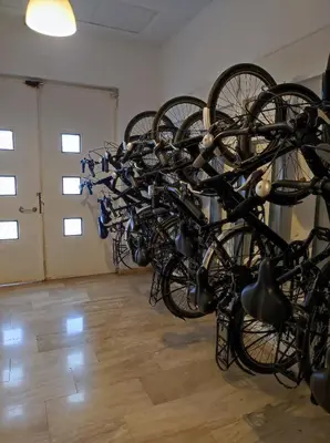a bunch of bikes parked in a room at Bright loft near the sea + BIKES in Valencia