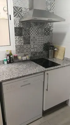 a kitchen with a stove and a counter top at Oceanográfico, Playa, Puerto Juanjo in Valencia