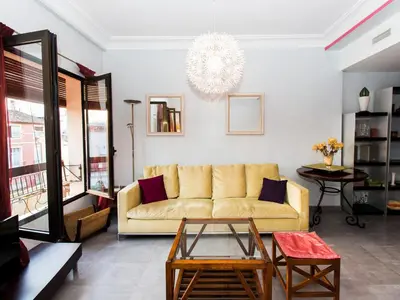 a living room with a couch and a table at Total Valencia El Carmen (Leisure & Culture) in Valencia