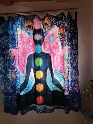 a curtain with a woman on a wall at Rony in Llaurí