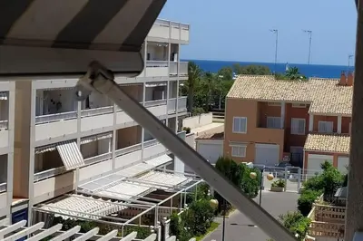 a view of a building from a balcony at Precioso apartamento en Canet d,en Berenger in Canet de Berenguer