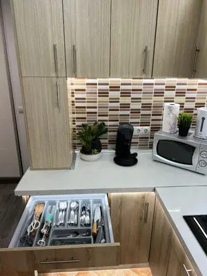 a kitchen with a sink and a microwave at Peset 69 in Valencia