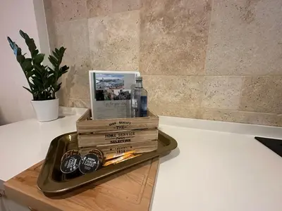 a tray with books and bottles on a table at Vista Golf in Valencia