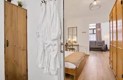 a white bathroom with a sink and a toilet at URBAN LOFT VALENCIA in Valencia