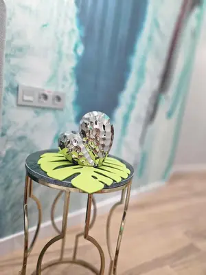 a table with a glass heart on top of it at Lounge garden sea mint fresh in Valencia