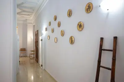 a hallway with plates on a white wall at SingularStays Salvador IV in Valencia
