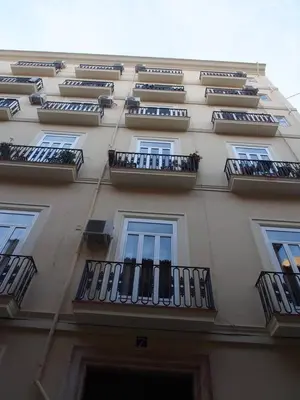 a tall building with balconies on the side of it at SingularStays SEU V in Valencia