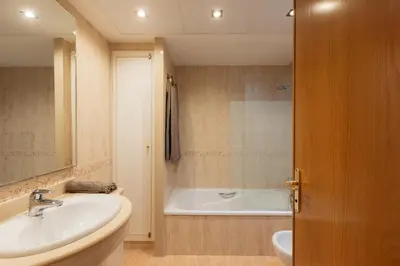 a bathroom with a sink and a bath tub at RESORT BEACH VALENCIA in Valencia