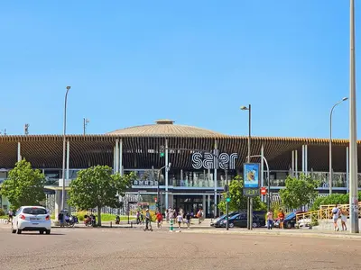 a large building with people walking in front of it at Apartamentos Las Ciencias Studio T in Valencia