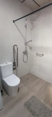 a white bathroom with a toilet and a shower at Estudio diseño cerca Ciudad Ciencias VT-55211-V in Valencia