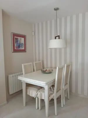 a white dining room table with chairs and a bowl on it at LAS VEGAS, esc-1, 7-14 in Cullera