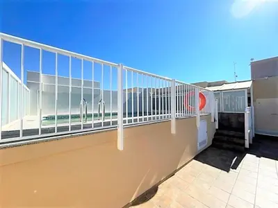 a balcony with white railing on top of a building at Apartment Grao de Moncofar Ref 041 in Moncófar