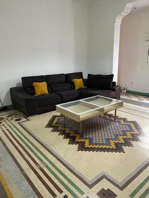 a living room with a couch and a coffee table at UIM Mediterraneo Pablo Iglesias Wifi in Puerto de Sagunto