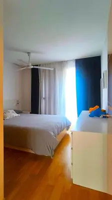 a bedroom with a bed with a pillow on it at Piso en el centro in Valencia
