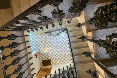 an overhead view of a staircase with wine racks at SingularStays Vivons in Valencia