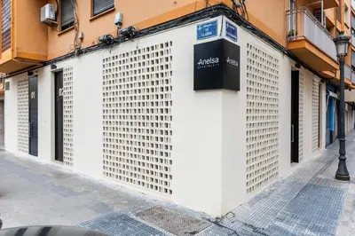 a white building with a lot of windows at Anelsa Torres de Serranos 3 in Valencia