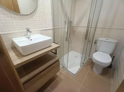 a bathroom with a sink and a shower and a toilet at MAGNIFICO APARTAMENTO · PLAYA CANET DE BERENGUER in Canet de Berenguer