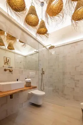 a bathroom with a toilet and a sink and a shower at Apartamento con piscina y terraza in Valencia