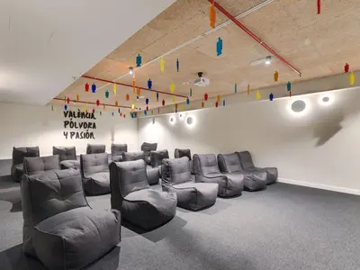 a waiting room with couches and chairs in it at Livensa Living Studios Valencia Viveros Hotel - Apartamento in Valencia