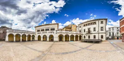 a large building with a blue sky in the background at La Casa de Matilde in Caudiel