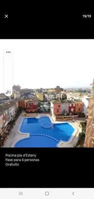 a screenshot of a picture of a swimming pool at Apartamento primerísima línea in Port Saplaya
