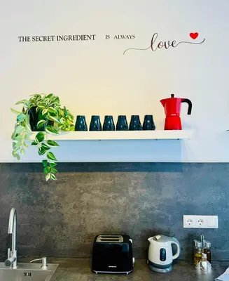 a kitchen counter with a sink and a shelf at Dorado Cabanyal - Luxury Beachside Charm in Valencia