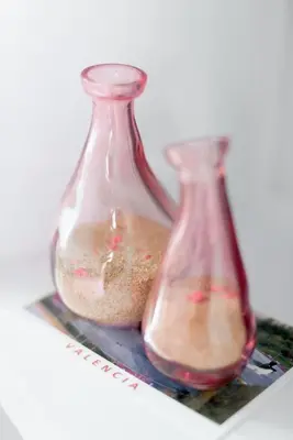 two glass vases sitting next to each other at Habitación céntrica de Lujo Gv 6 in Valencia
