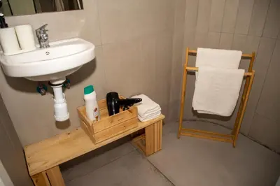 a bathroom with a sink and a white sink at lifecoliving valencia loft B in Valencia