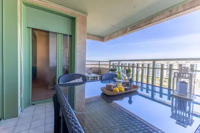 a balcony with a view of the ocean at SAPORE DI MARE in Valencia